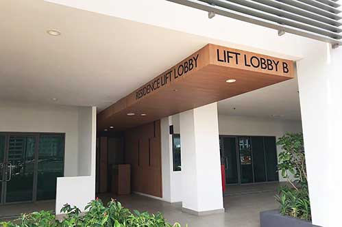 Condominium directional signage lettering